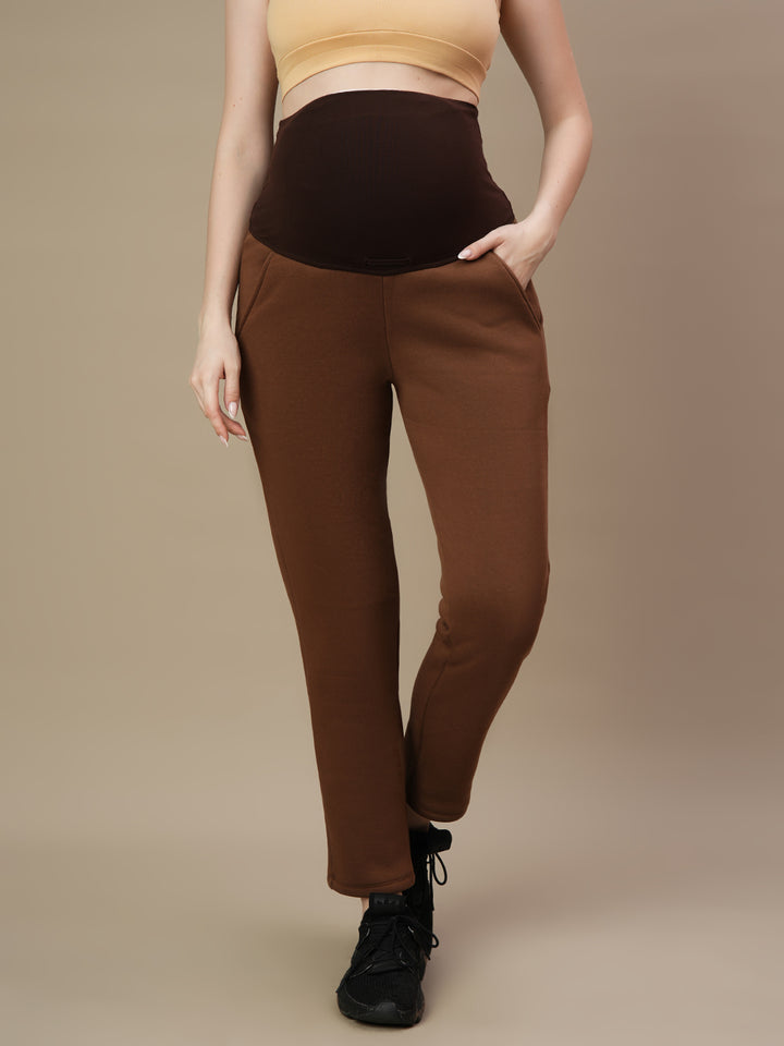 Front view of Wobbly Walk Brown Maternity Fleece Pants featuring an over-belly, elastic-free waistband