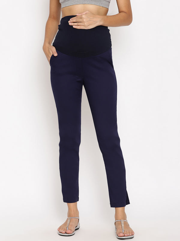 Mamalicious Maternity over the bump seam detail flare trousers in navy   ASOS