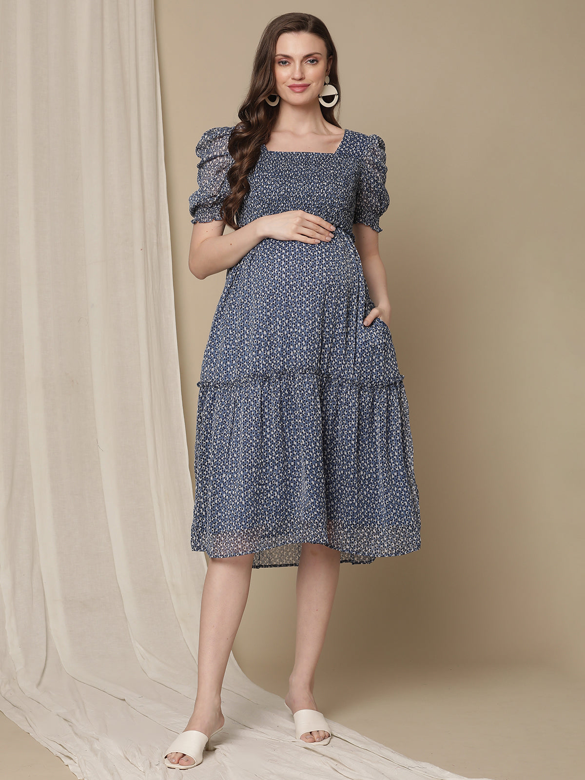https://www.wobblywalk.com/cdn/shop/products/blue-polka-dot-maternity-dress1_2400x.jpg?v=1680554303